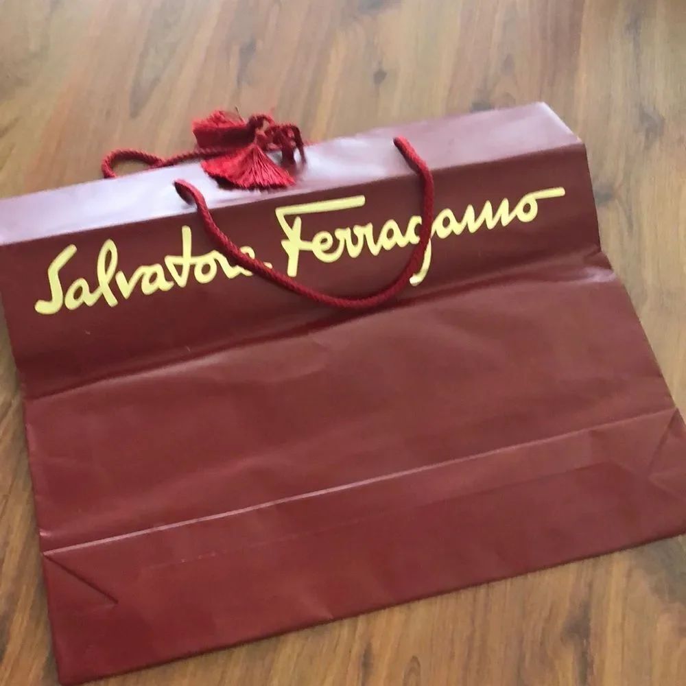 Salvatore Ferragamo Red and gold shopping bag.